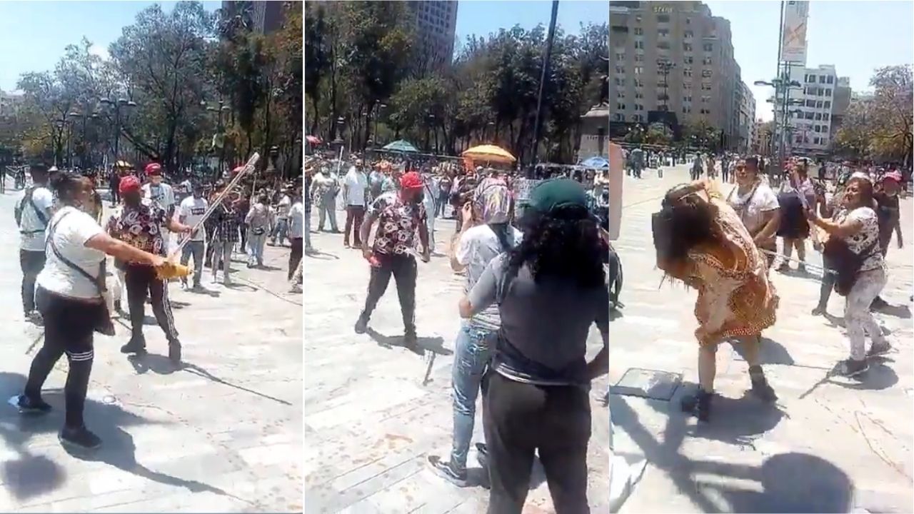 Comerciantes agreden con palos a feministas en las inmediaciones de Bellas Artes en la CDMX