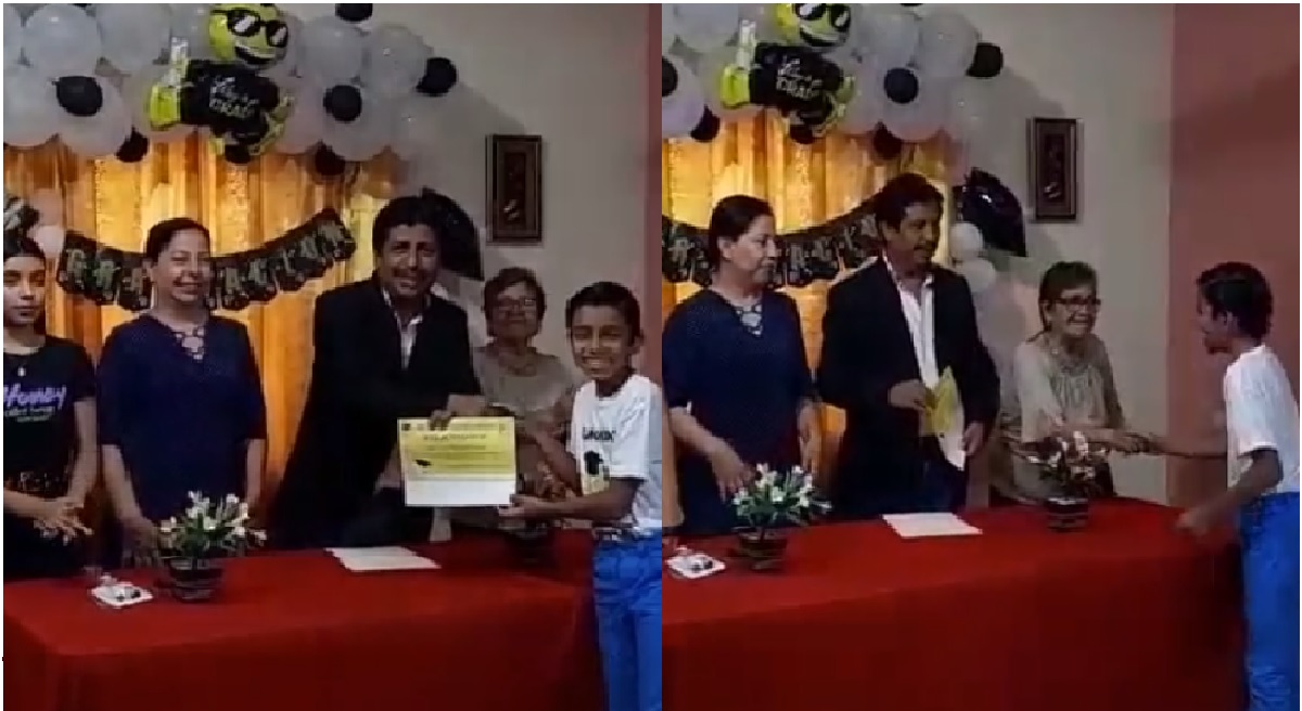 niño recibiendo su diploma de graduacion de primaria a lado de su familia