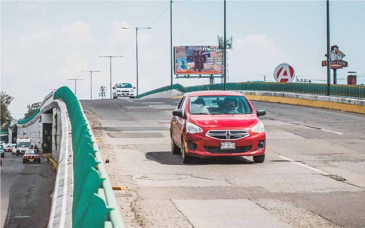 auto en puente en camino a pagar la tenencia estado de mexico 2022