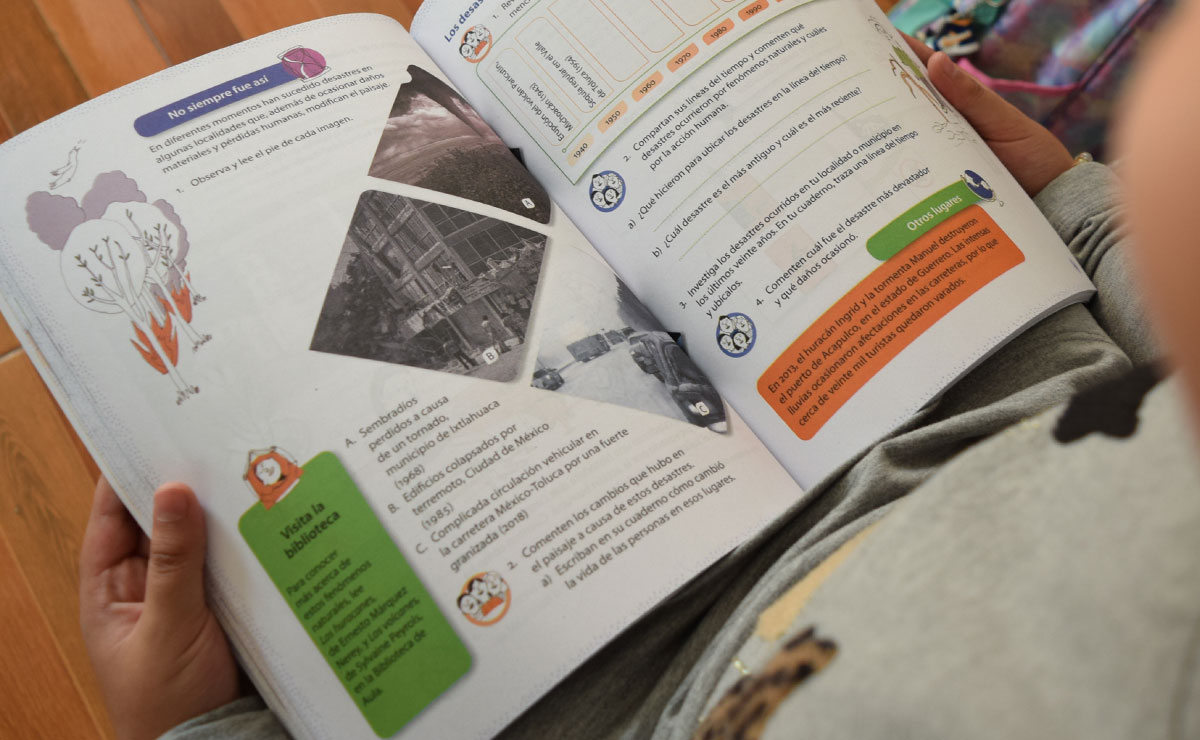 Niño leyendo para obtener la calificación aprobatoria SEP