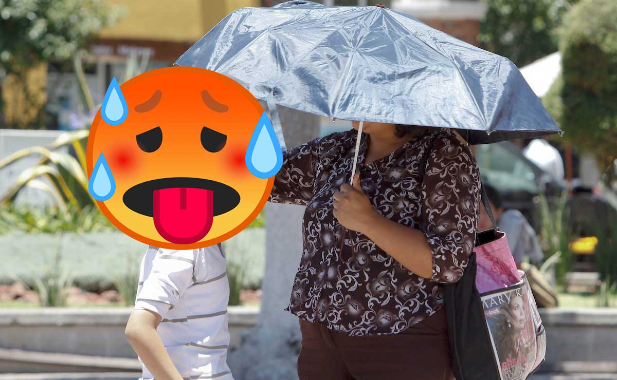 Niño tapado con paraguas por el calor