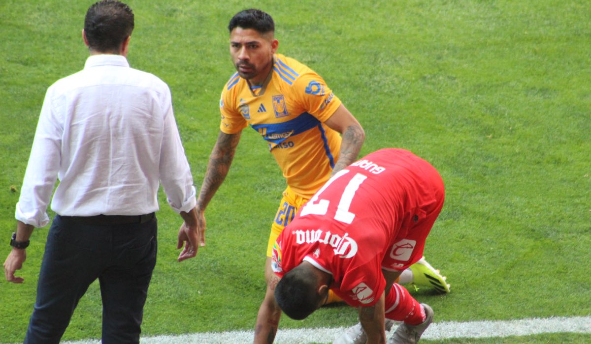 Jugadores Toluca FC y Tigres